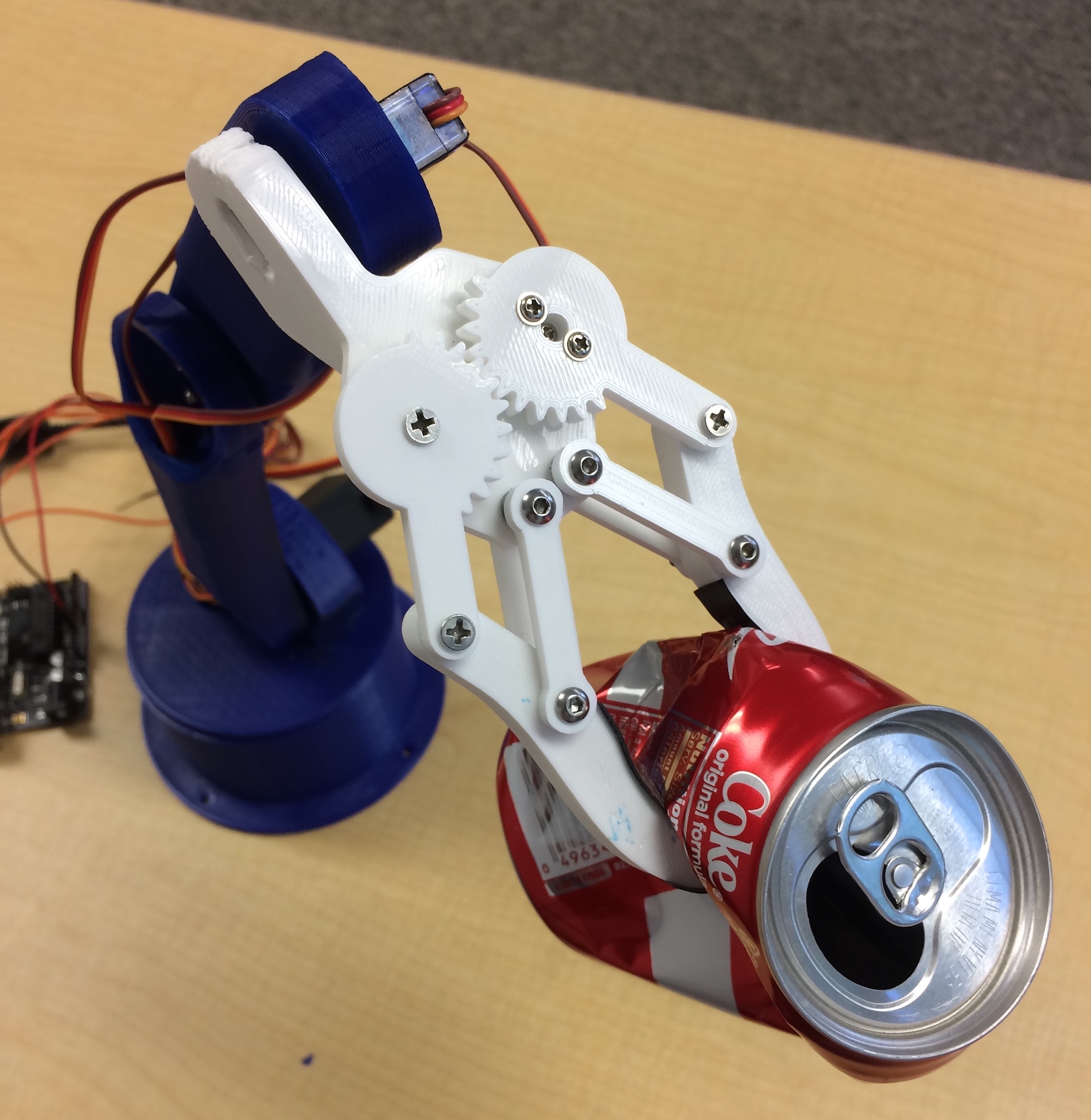 robotic arm with soda can Andrew Bernas